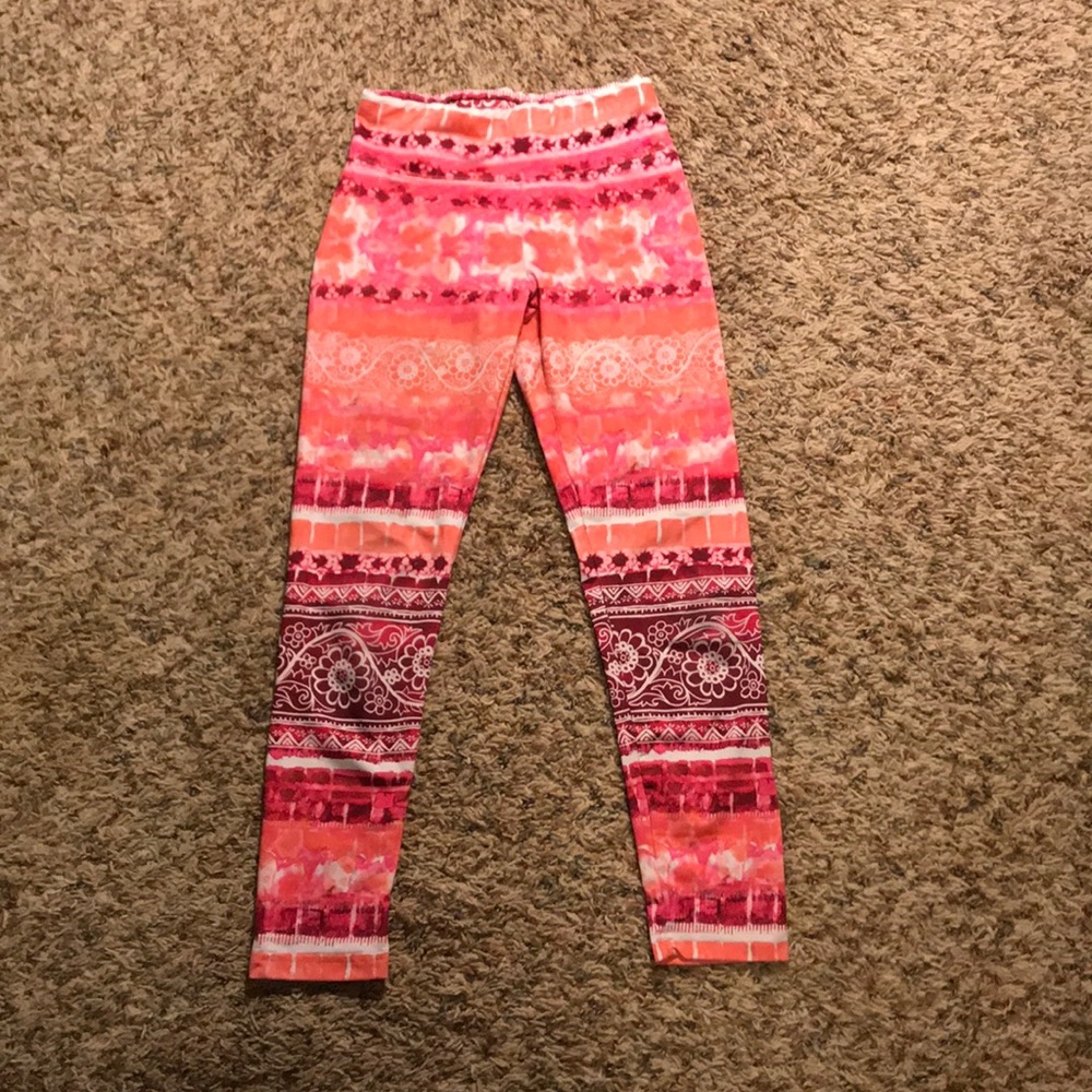 Pink and orange leggings with Mandela design